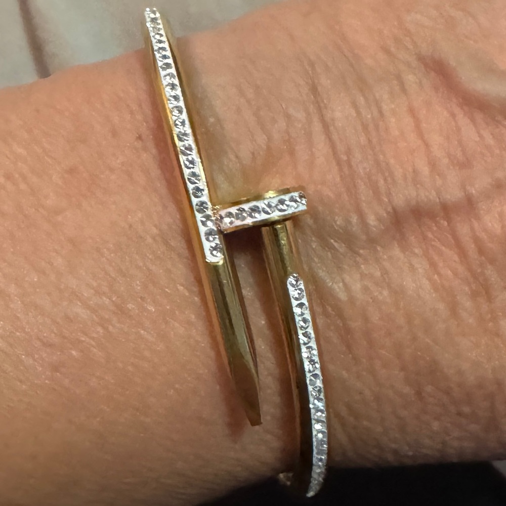 Elegant Gold and CZ nail wrap bracelet .